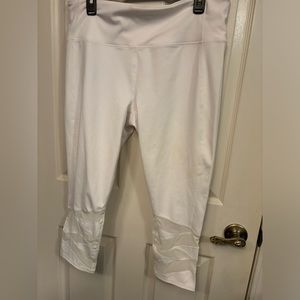 Athleta White Capri Leggings. Sheer criss cross design on lower legs. Worn once